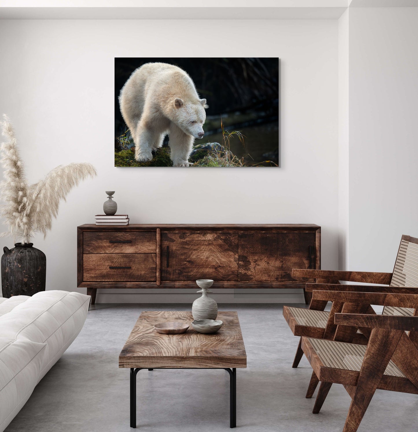 Spirit Bear Peers Past Grass