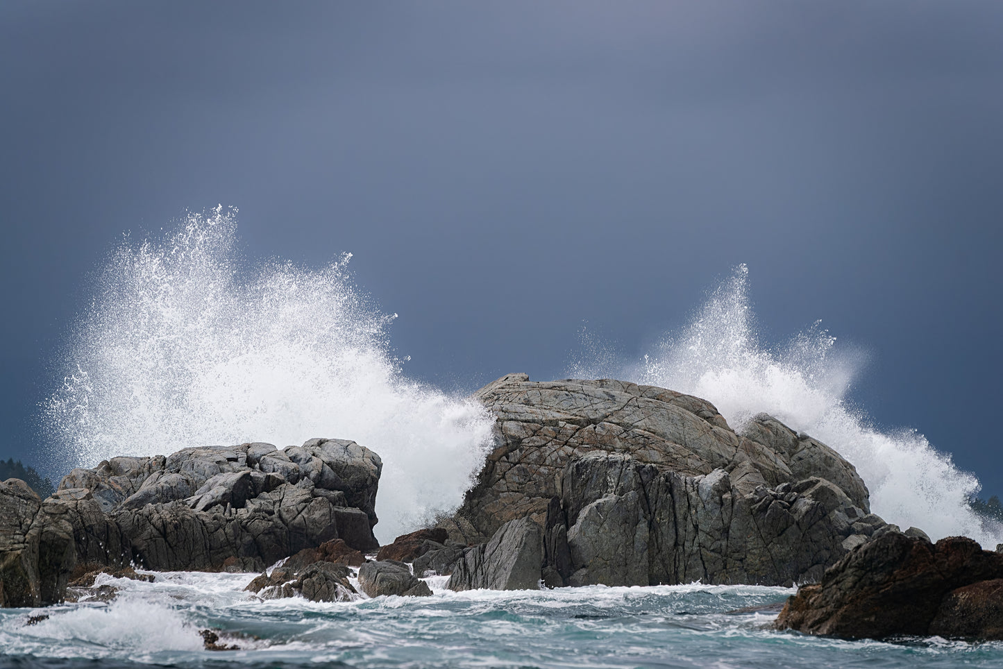 Waves Crash Through Rocks